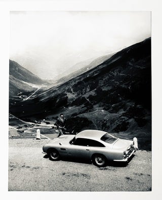 Item #66826 Goldfinger (1964). Publicity photographs [James Bond with Aston Martin]. Ian Fleming...